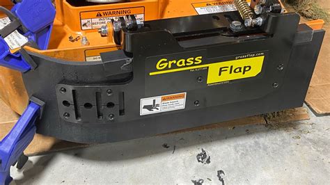 The chute blocker plate opens a full 180 degrees and complete. . Grass flap
